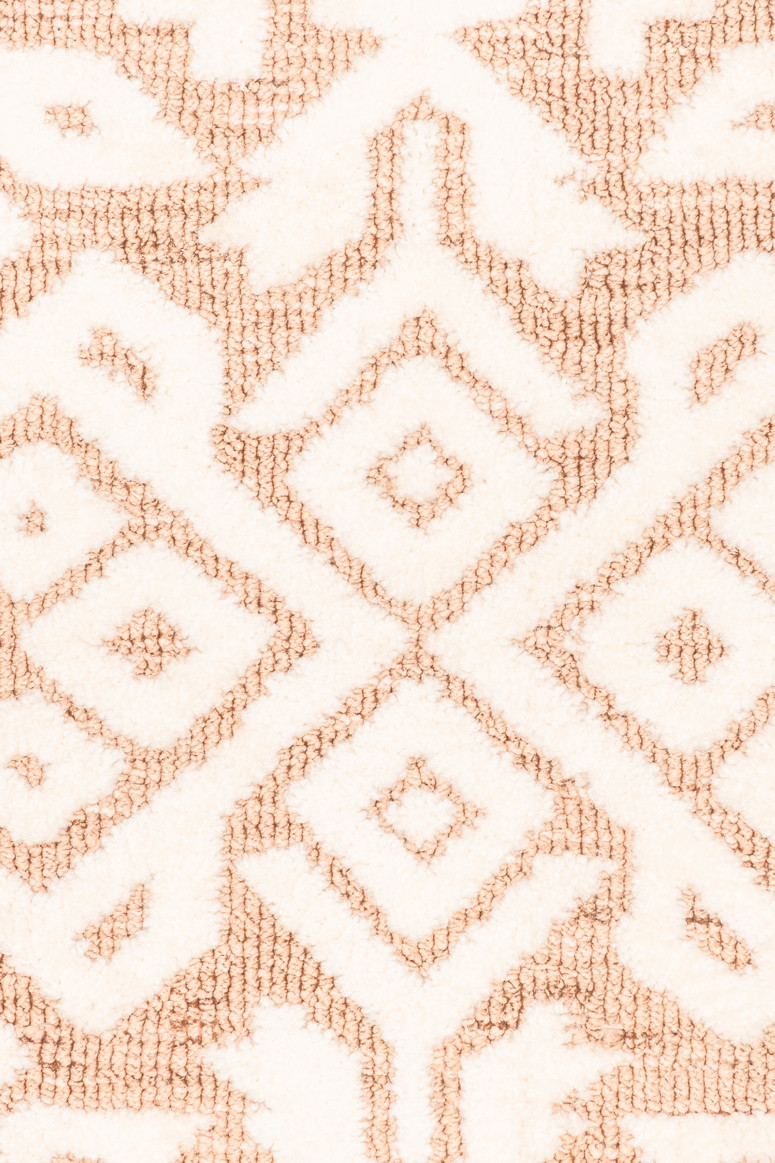 Miss Amara Paloma Peach and Ivory Tribal Patterned Round Rug Play
